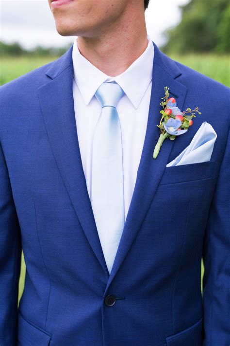 navy suit with royal blue tie